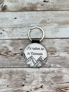 I'd Rather be in Colorado 2 Inch Round Leather Keychain