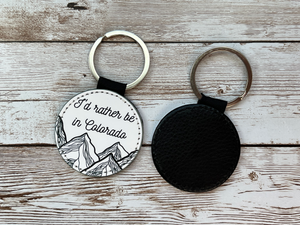 I'd Rather be in Colorado 2 Inch Round Leather Keychain